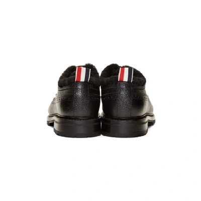 Shop Thom Browne Black Shearling Classic Longwing Brogues In 001 Blk