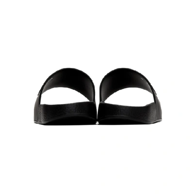 Shop Valentino Black  Garavani Vlogo Pool Slides In 0ni Blk Wht