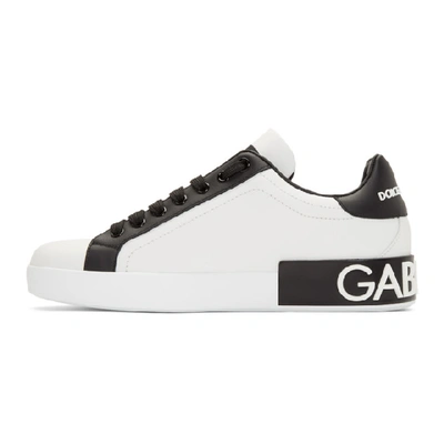 Shop Dolce & Gabbana Dolce And Gabbana White Paint Portofino Sneakers In 89697 White