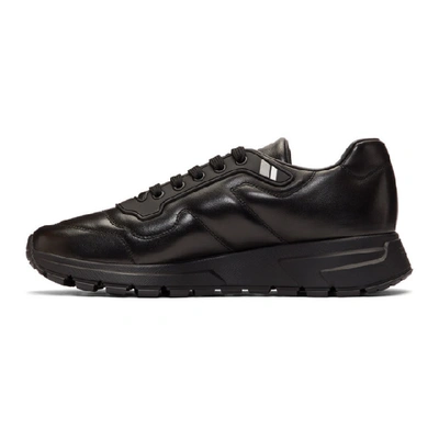 Shop Prada Black Prax 01 Sneakers