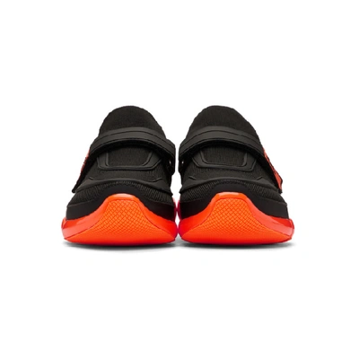 Shop Prada Black & Orange Cloudbust Trainers