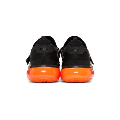 Shop Prada Black & Orange Cloudbust Trainers