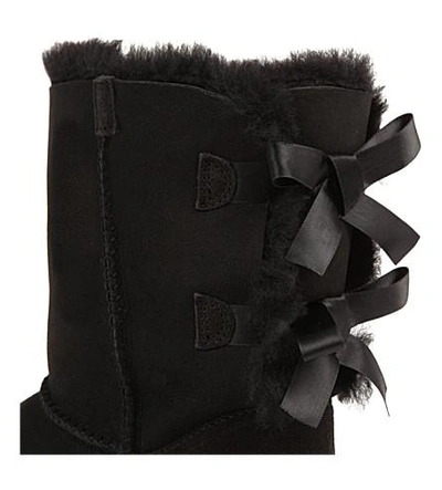 Shop Ugg Bailey Bow Sheepskin Boots In Black
