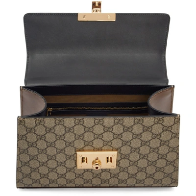 Shop Gucci Brown Small Gg Supreme Padlock Bag In 9785 Brown