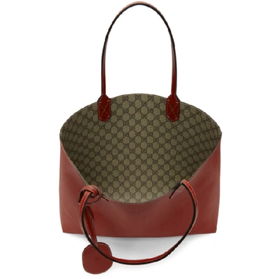 Shop Gucci Reversible Medium Gg Logo Tote In 8411 Red