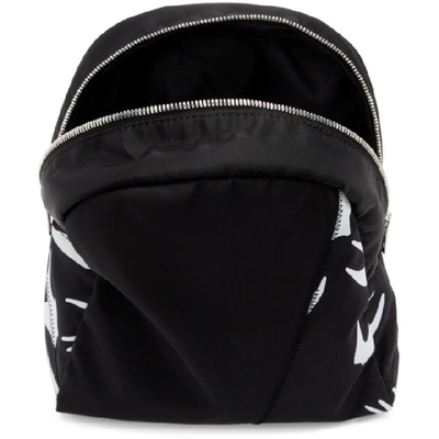 Shop Mcq By Alexander Mcqueen Mcq Alexander Mcqueen Black Knotted Swallow Sling Backpack In 1006 Blk/wh