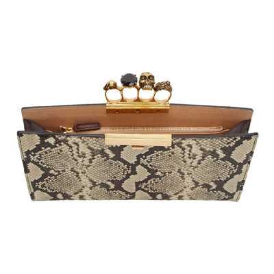 Shop Alexander Mcqueen Beige Python Four Ring Clutch In 1250 Roccia