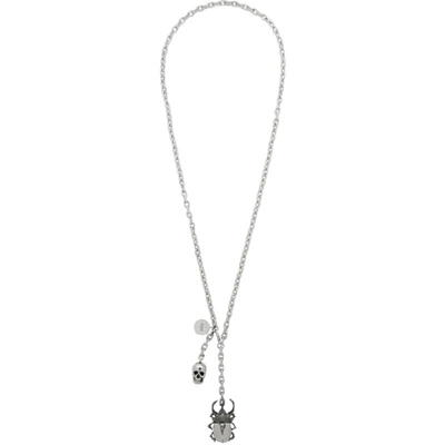 Shop Alexander Mcqueen Silver Beetle And Skull Necklace In 1250 0446+0