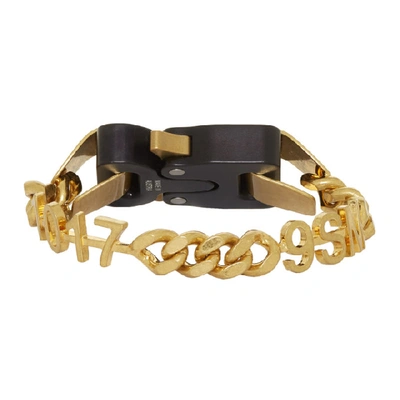 Shop Alyx 1017  9sm Gold And Black Hero Bracelet In Gld0001