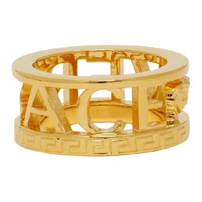 Shop Versace Gold Cut-out Logo Ring In D00h Gold