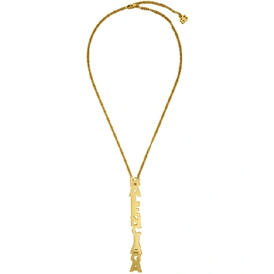 Shop Balenciaga Gold Typo Necklace In 0705 Gold