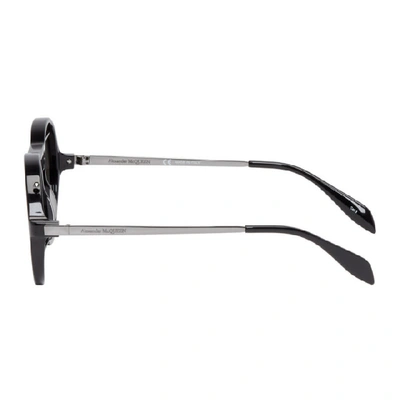 Shop Alexander Mcqueen Black Round Piercing Sunglasses In 050 Rutgrey