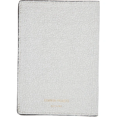 Shop Common Projects White Cracked Folio Passport Holder In 0506 Crkwht