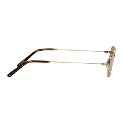 Shop Oliver Peoples Gold Indio Sunglasses In Amber