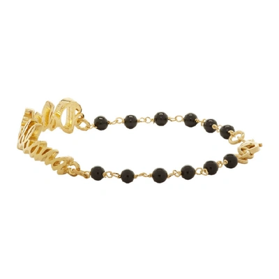 Shop Dolce & Gabbana Dolce And Gabbana Gold Ball Logo Bracelet