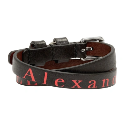 Shop Alexander Mcqueen Black Double Skull Bracelet In 1075 Blkred