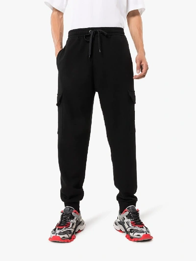 Shop Burberry Logo Appliqué Track Trousers In Black