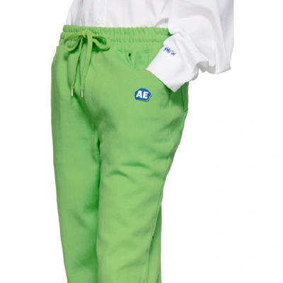 Shop Ader Error Green Stone Logo Lounge Pants In Negr Neon G