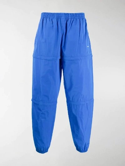 Shop Balenciaga Zipped Logo Track Pants In Blue