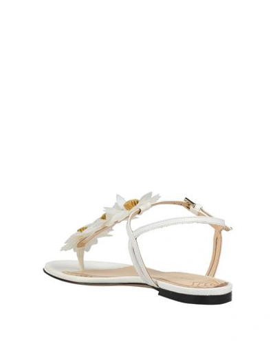 Shop Charlotte Olympia Flip Flops In White