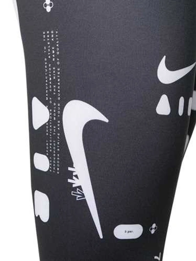 Shop Nike Air Logo Printed Leggings In Black