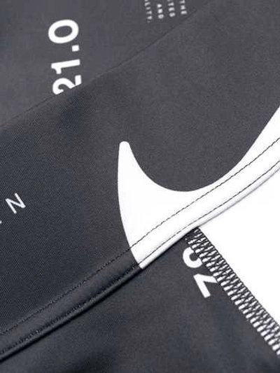 Shop Nike Air Logo Printed Leggings In Black