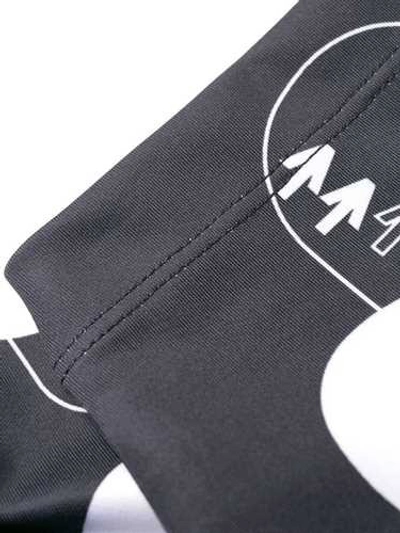 Shop Nike Air Logo Printed Leggings In Black