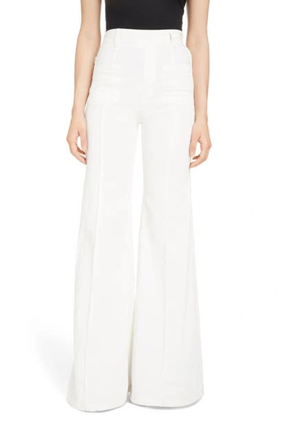 Shop Chloé Patch Pocket Flare Jeans In White