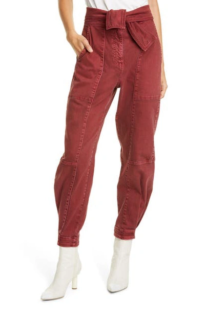 Shop Ulla Johnson Wade Tie Waist Tapered Jeans In Syrah