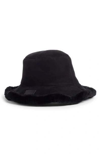 Shop Ugg Genuine Shearling Trim Bucket Hat In Black