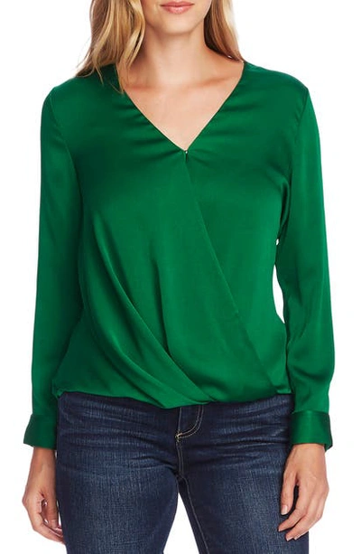 Shop Vince Camuto Faux Wrap Satin Blouse In Everglade