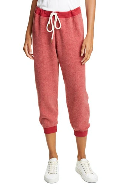 Shop The Great The Cropped Sweatpants In Poinsettia