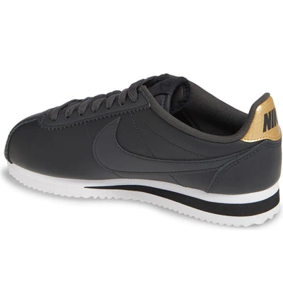 Shop Nike Classic Cortez Sneaker In Off Noir/ Black/ Metallic Gold