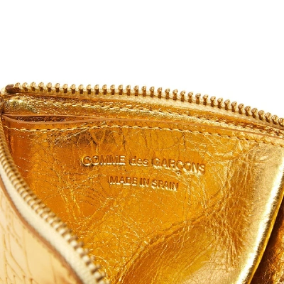 Shop Comme Des Garçons Comme Des Garcons Sa3100eg Embossed Logo Wallet In Gold