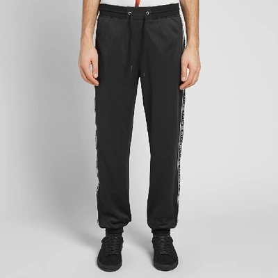 Shop Givenchy Taped Track Pant In Black