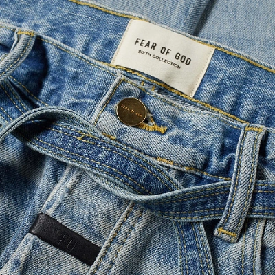 Shop Fear Of God Slim Distressed Jean In Blue