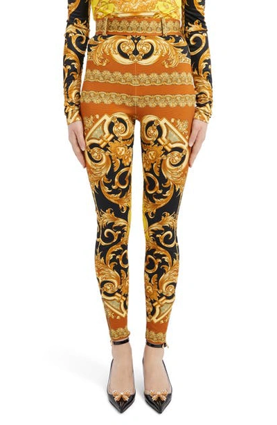 Shop Versace Barco Print Zip Hem Belted Pants In Yellow