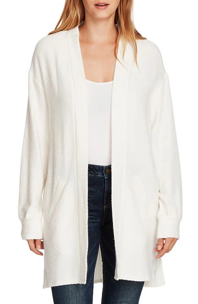 Shop Vince Camuto Cinch Back Cable Knit Cardigan In Pearl Ivory