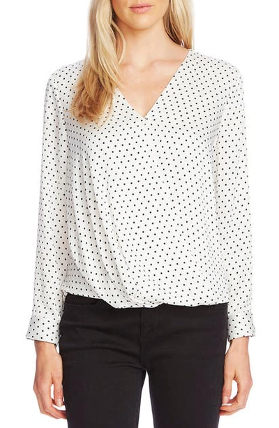 Shop Vince Camuto Fiesta Dot Wrap Front Long Sleeve Hammered Satin Blouse In Pearl Ivory