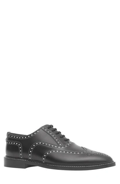 Shop Burberry Lennard Wingtip In Black/ White