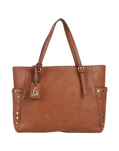 Shop Steve Madden Handbags In Tan
