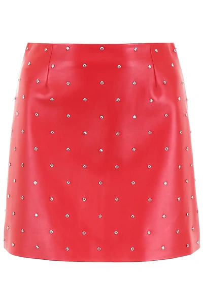 Shop Miu Miu Studded Leather Mini Skirt In Red,metallic