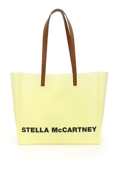 Shop Stella Mccartney Small Tpu Logo Shopper In Yellow,brown