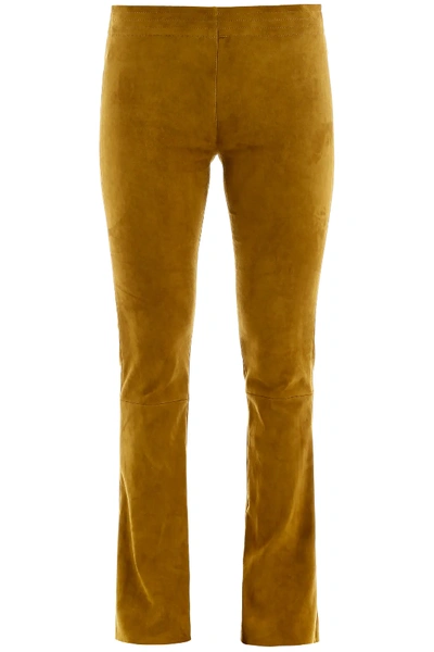 Shop Drome Suede Trousers In Yellow,green