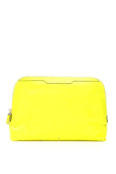 Shop Anya Hindmarch Lotions And Potions Pouch In Yellow