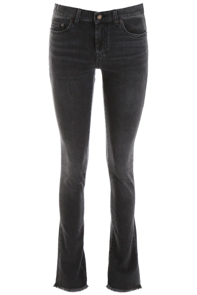 Shop Saint Laurent Used Effect Jeans In Black