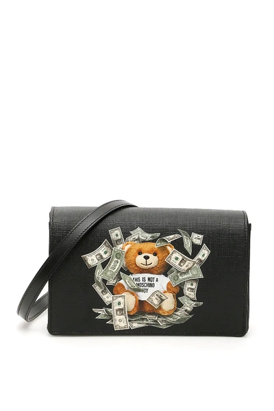 Shop Moschino Dollar Teddy Bear Crossbody Bag In Black