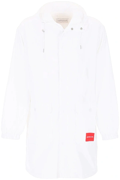 Shop Calvin Klein Jeans Est.1978 Logo Raincoat In White,red