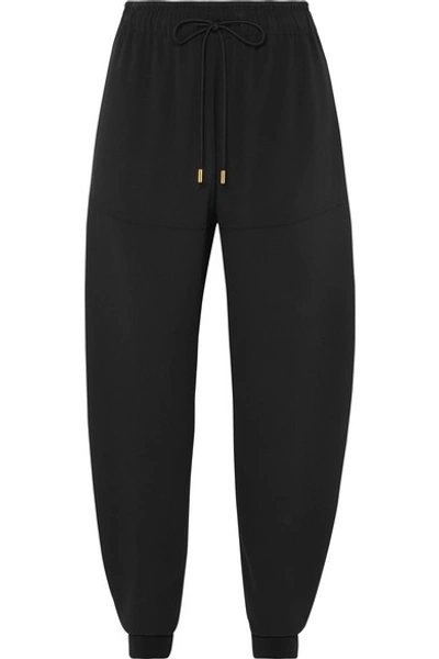 Shop Chloé Satin-jersey Tapered Track Pants In Black