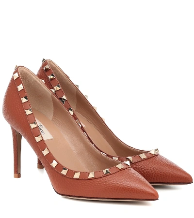Shop Valentino Rockstud Leather Pumps In Brown
